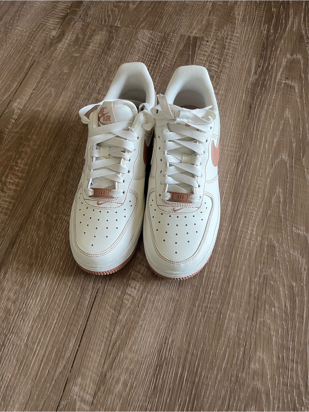 Nike Sneakers in Cream with Pink Swoosh
